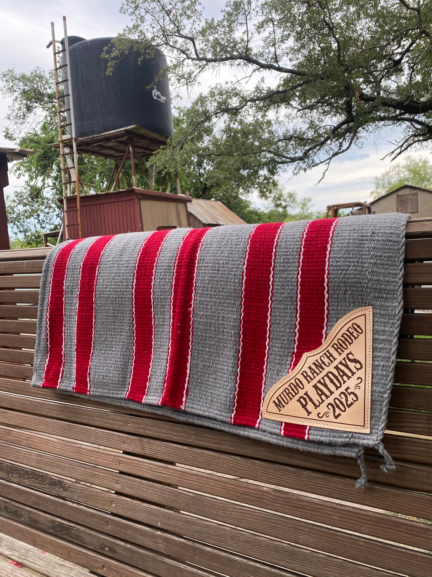 double weave acrylic saddle blanket with laser-engraved leather custom corner plates