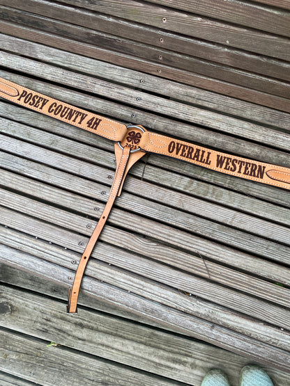custom engraved western breast collar displayed as a trophy award
