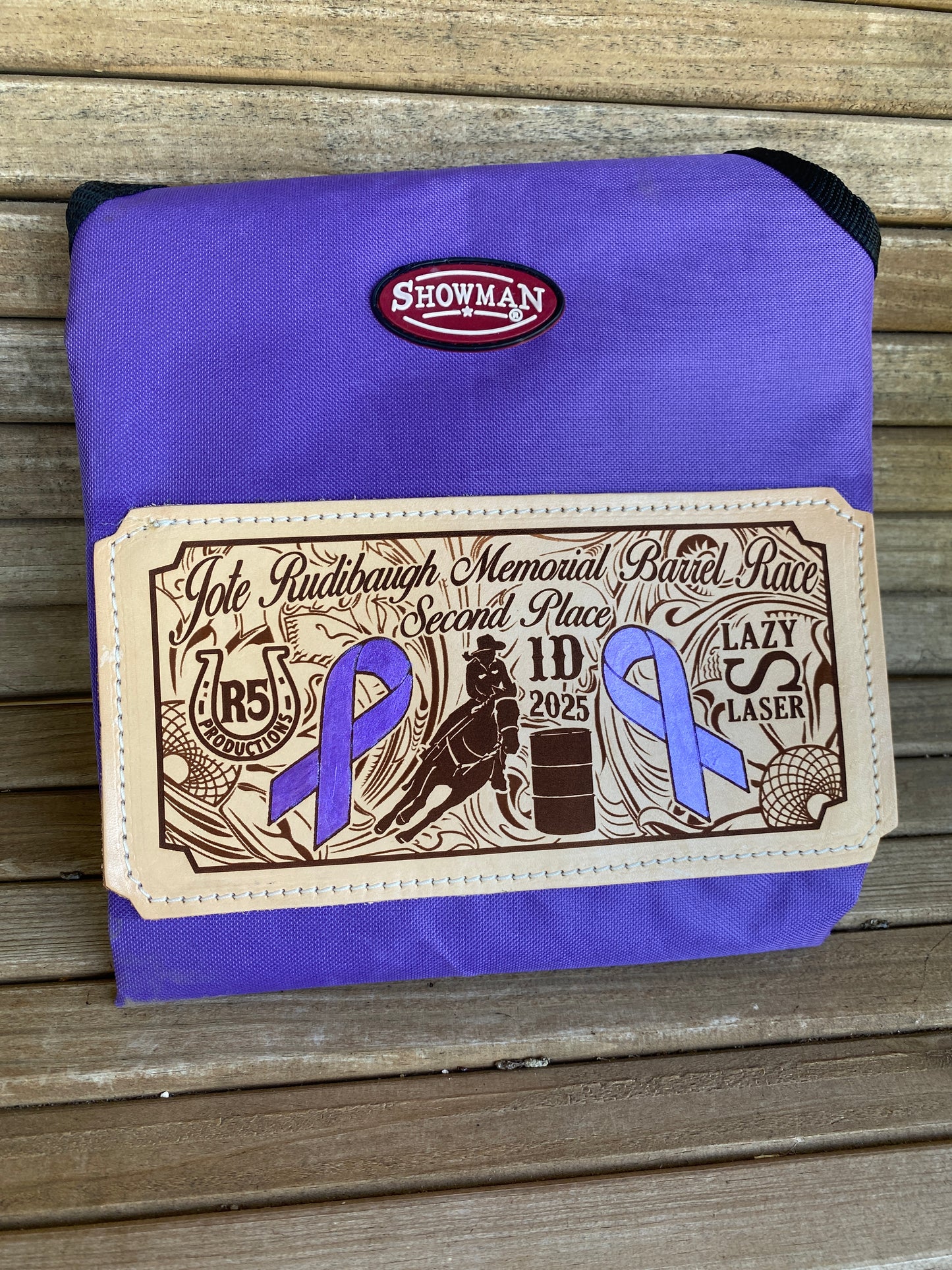 Custom equestrian hay feeder bag with barrel race logo engraving and sponsorship logos for the benefit